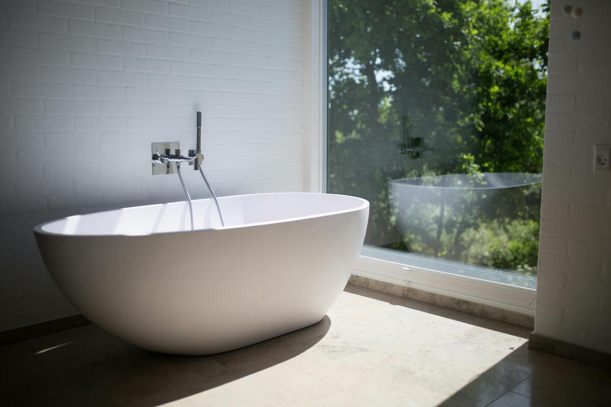 free-standing bath by window, Scandi bathroom